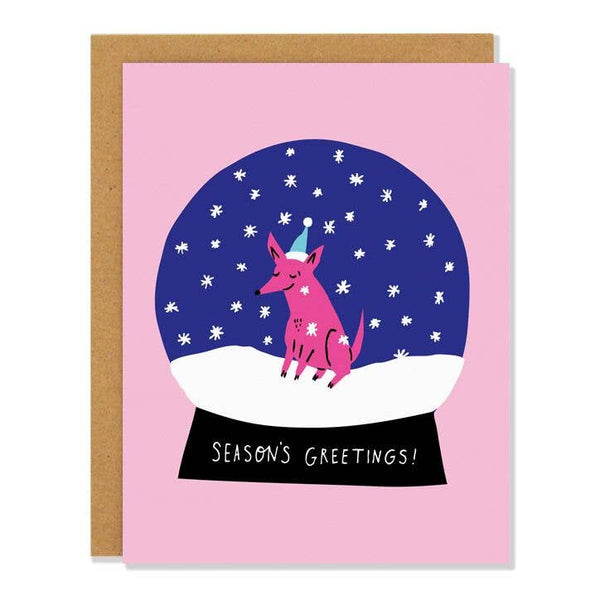 holiday card featuring a small dog inside a snow globe and text that reads "Season's greetings" 