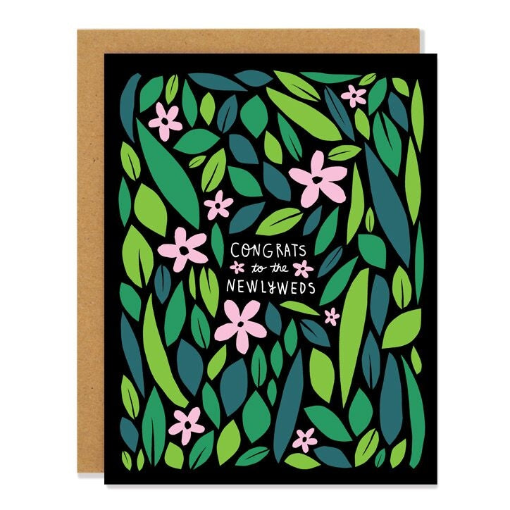 greeting card with wildflowers and text that reads "congrats to the newlyweds" 
